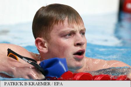 Înotătorul britanic Adam Peaty la un nou record mondial Înotătorul britanic Adam Peaty la un nou record mondial